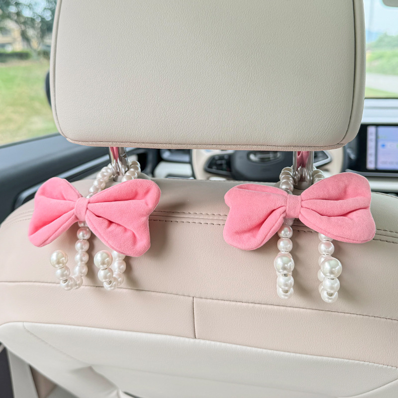 車の後部座席用の白い真珠のフック,かわいい蝶ネクタイハンガー - Car Accessories Hanging のレビューと価格