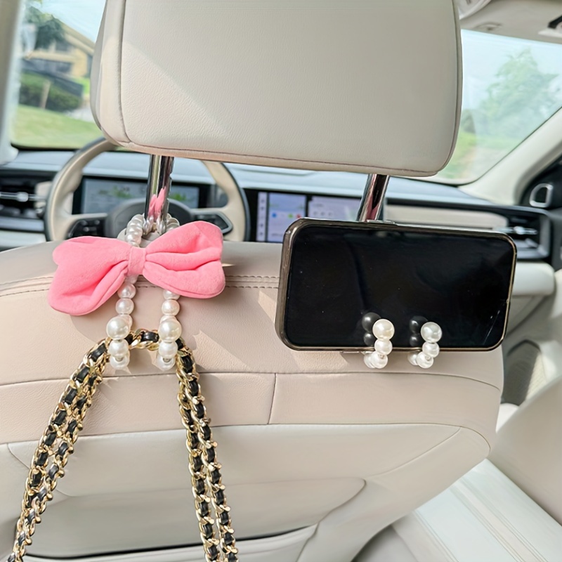 車の後部座席用の白い真珠のフック,かわいい蝶ネクタイハンガー - Car Accessories Hanging のレビューと価格